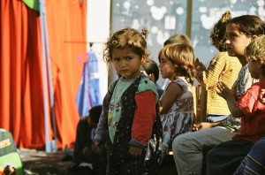 More gypsy children wait for the show