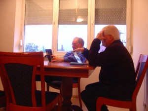 Bluey & Conk at the flat catching up with news on the Net